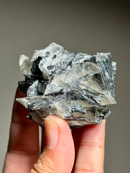 Stibnite in Calcite