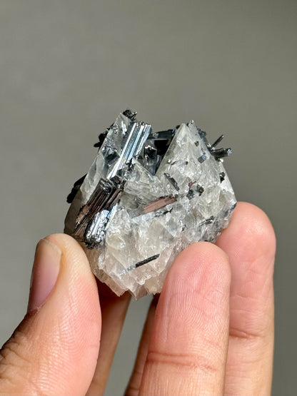 Stibnite in Calcite
