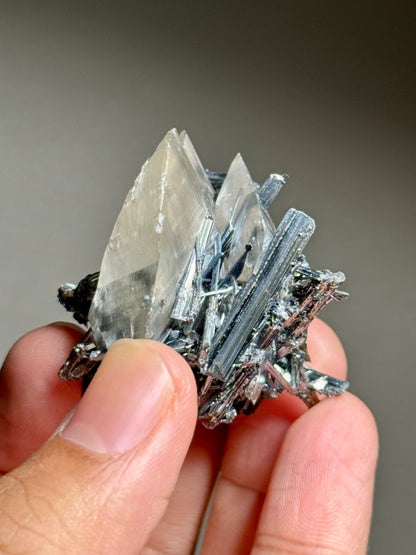 Stibnite in Calcite