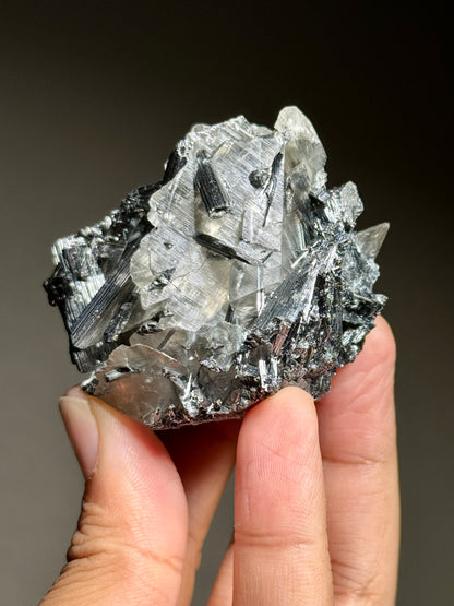 Stibnite in Calcite